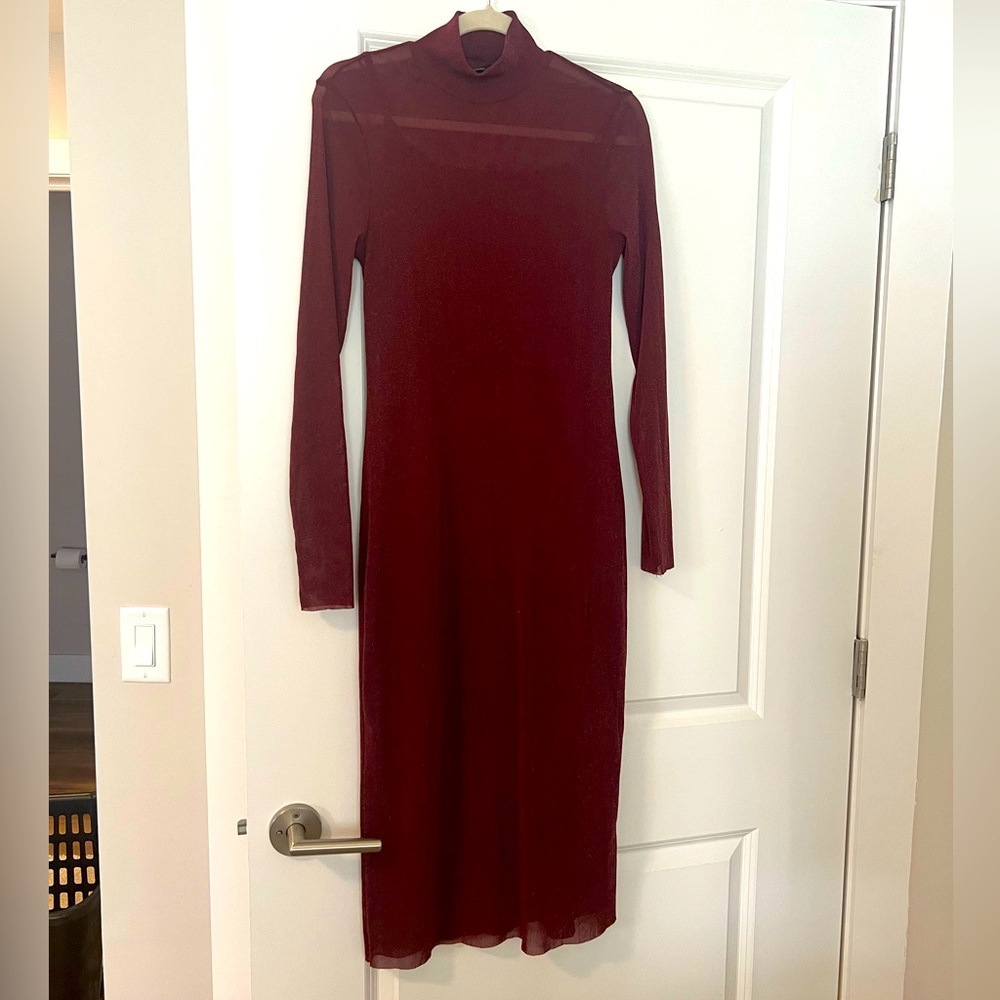 Long see through dress with matching slip.